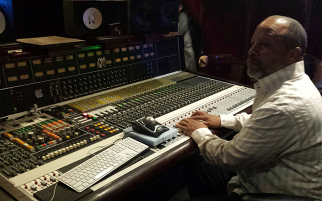 Ralph Sutton Mixing Services, riding the faders during a mixing session